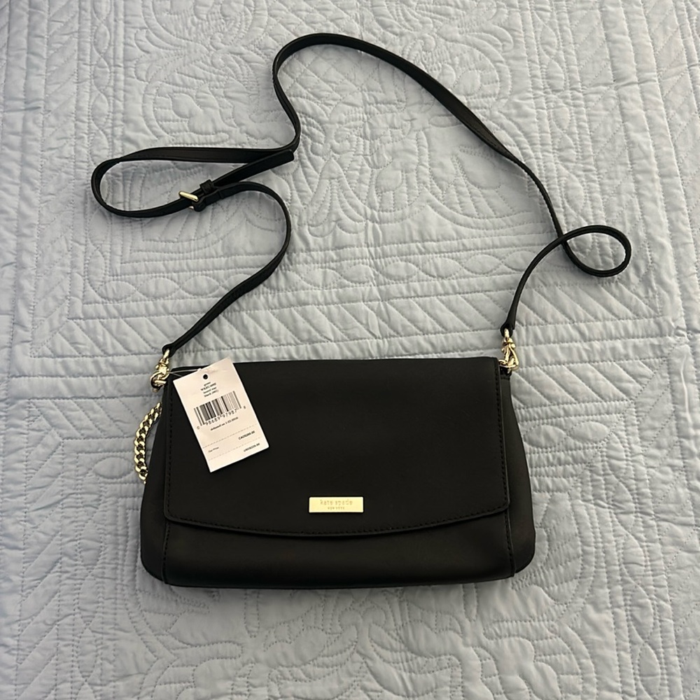 NWT Kate Spade crossbody bag. Black with gold chain accent and gold hardware.